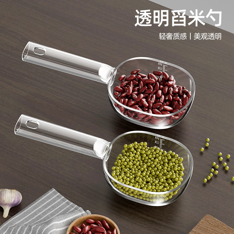 Acrylic  scoop with a long handle and clearly marked measurements