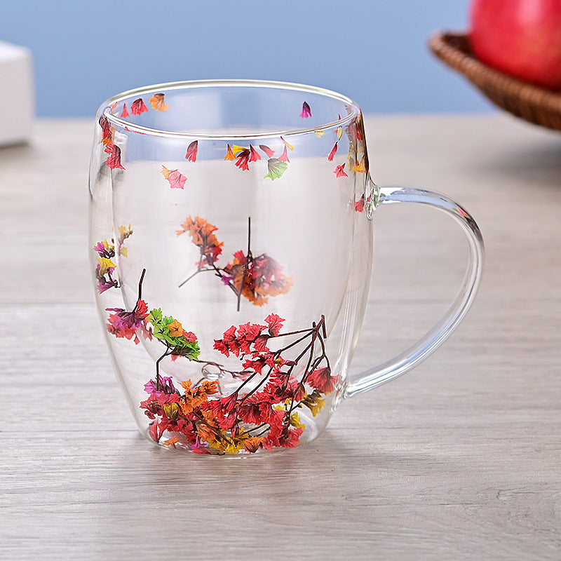 High borocillicate double-wall glass mug with pressed floral designs