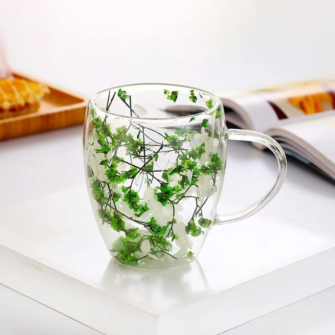 High borocillicate double-wall glass mug with pressed floral designs